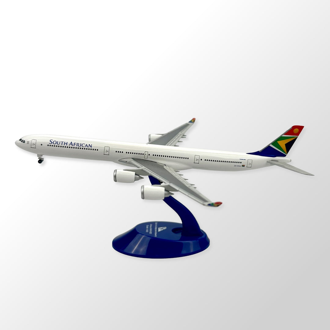 Model airplane of South African Airways on a white background