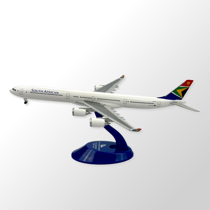 Model airplane of South African Airways on a white background