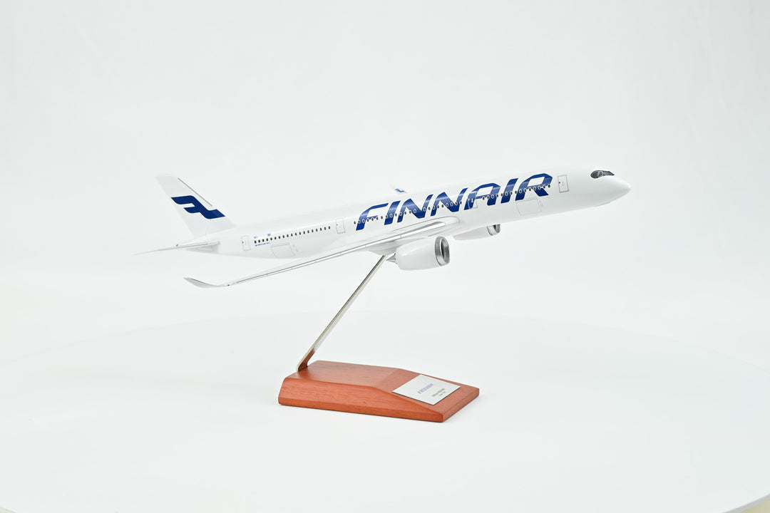 Detailed close-up of Finnair logo on Airbus A350-900 model