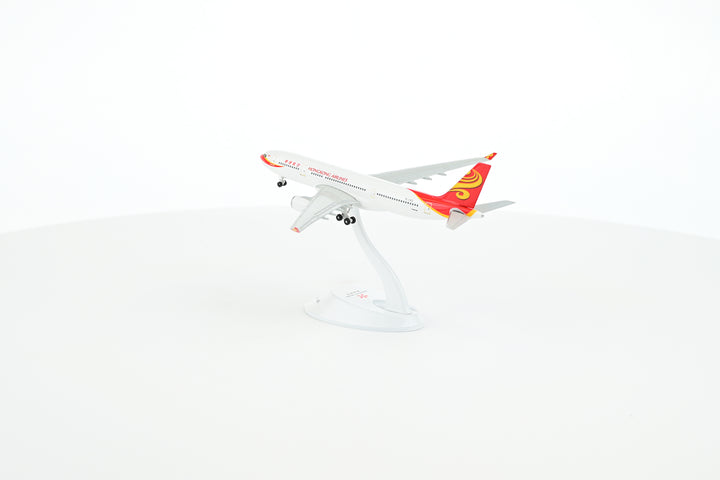 Collector's HK Airlines Airbus A330-200 1:400 B-LND model displayed on plastic stand