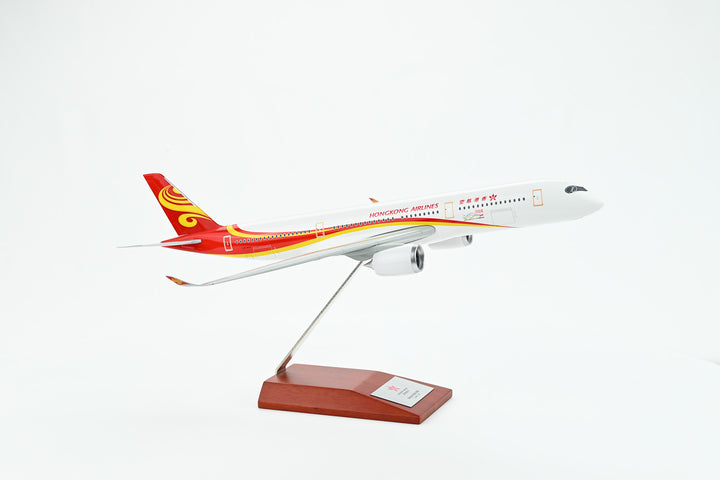 1:200 scale model Hong Kong airlines A350-900 aircraft, white with red and orange detailing, mounted on a display stand
